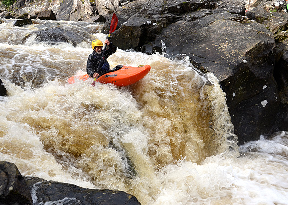 Boofing the lesser run right hand line on the upper section