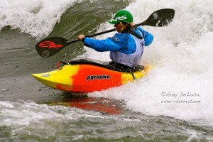 Me surfing out to the green wave to set up for a trick.